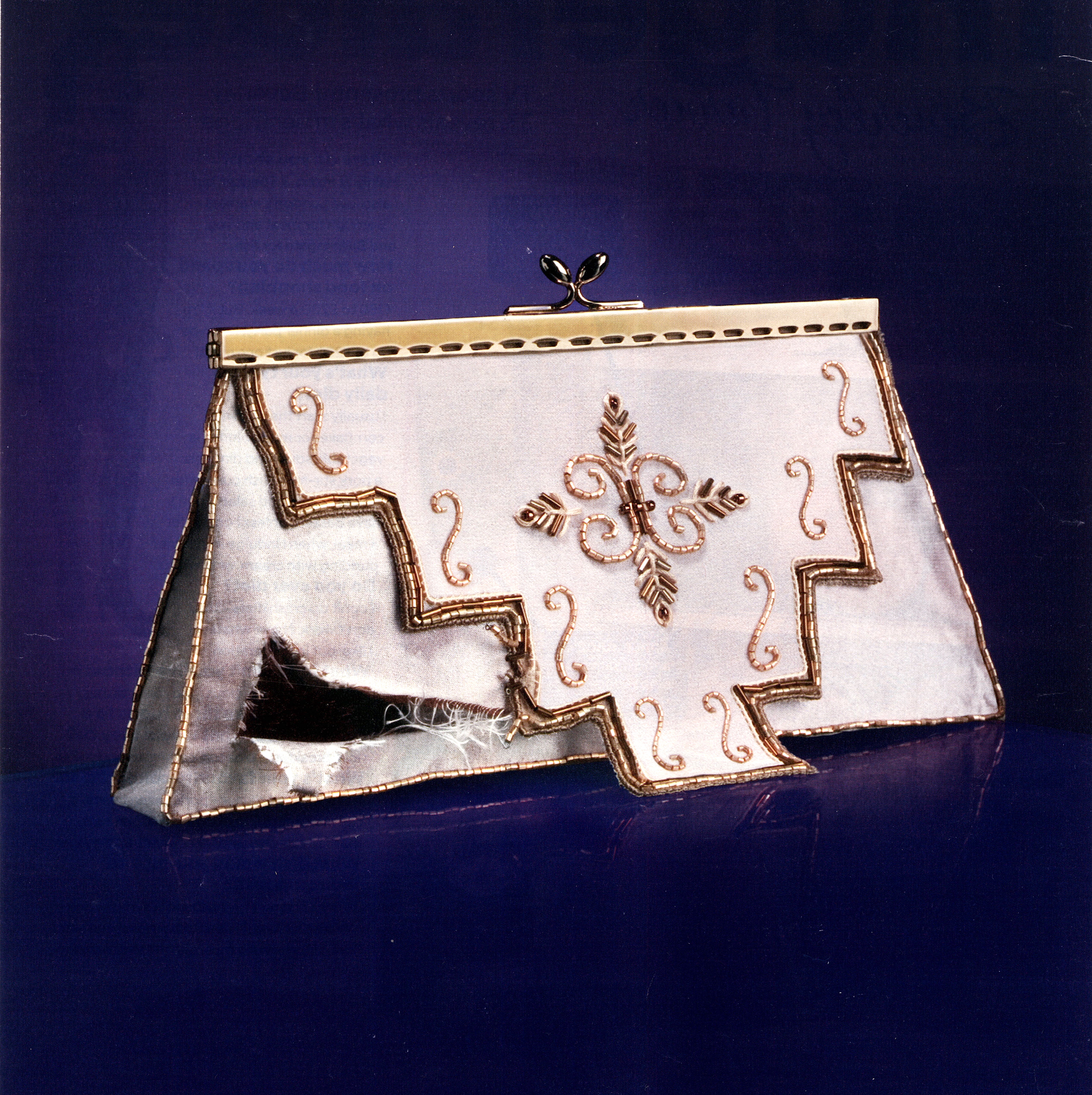 Silk hand-beaded handbag for Immodium advert Team Saatchi © Dan Maier