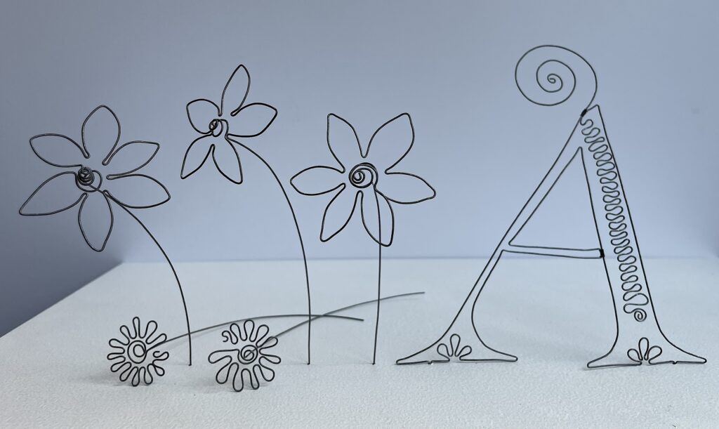 Wire letter A initial and wire flowers